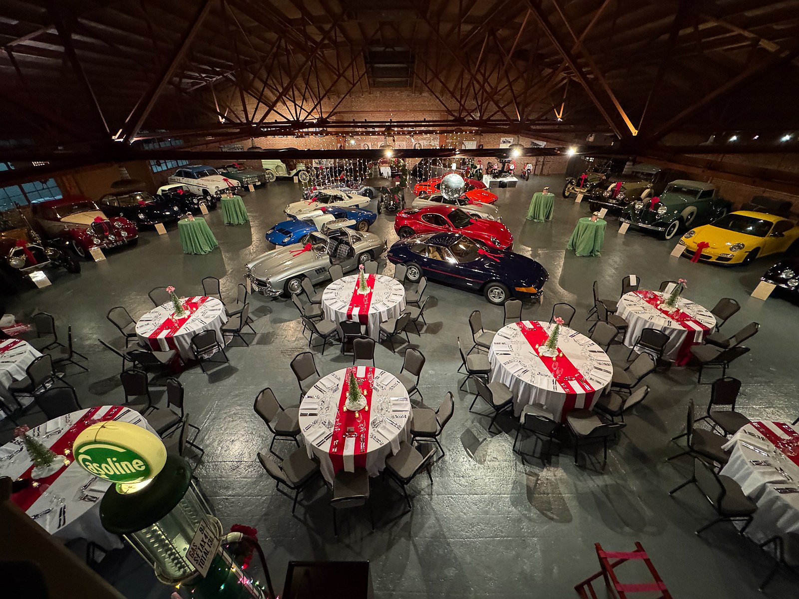 The hall seen from above, tables set for a holiday dinner